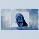 A photograph of a the back of a woman wearing a blue hijab atop a sky blue background with clouds and pale blue frame